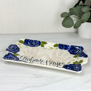 Large tray decorated with blue florals and two children's handprints 