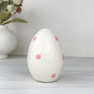 easter egg with pink polka dots.