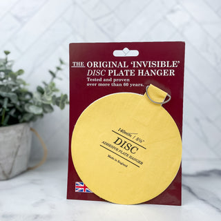 Adhesive plate hanger 
