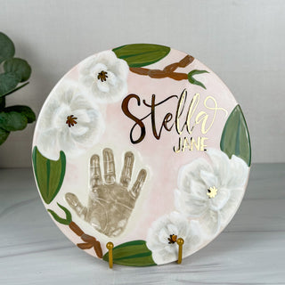 Magnolia themed platter made with a child's handprint. 