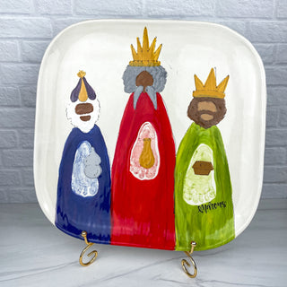 Square plate decorated with the Three Wisemen made from children's footprints 