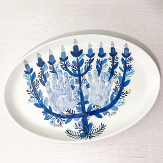 Large platter decorated with a menorah and two children's handprints 