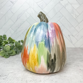 Pumpkin decorated with colorful line art